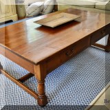 F18. Two-drawer coffee table. 18”h x 54”w x 30”d 